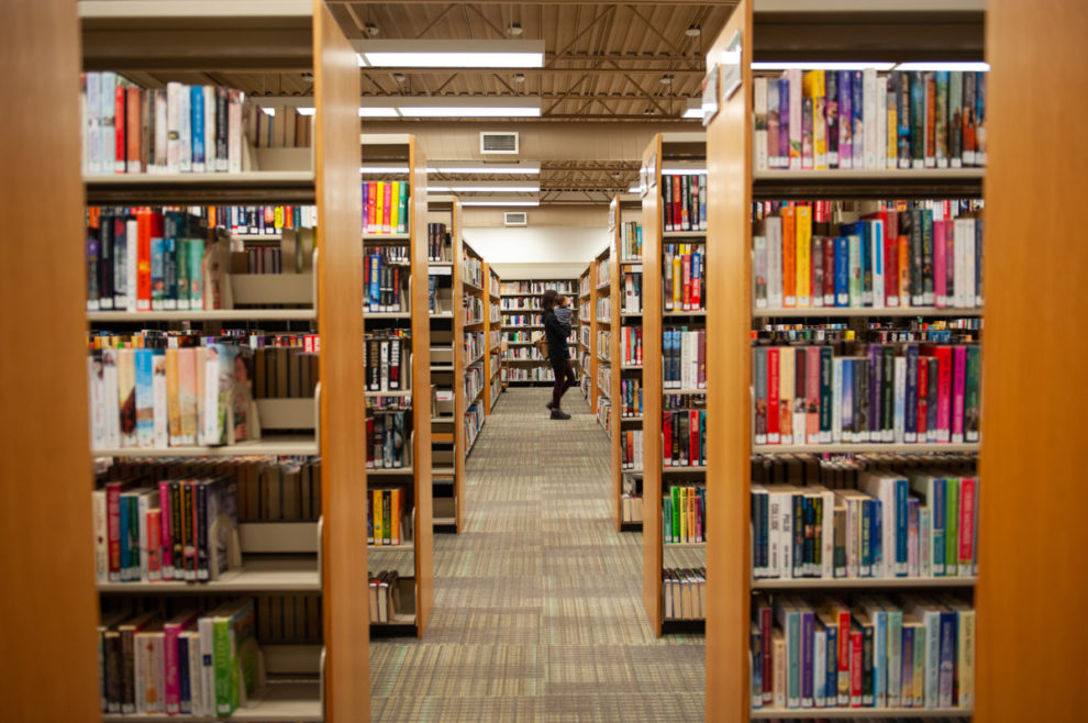 Rows of book shelves at Cameron Branch